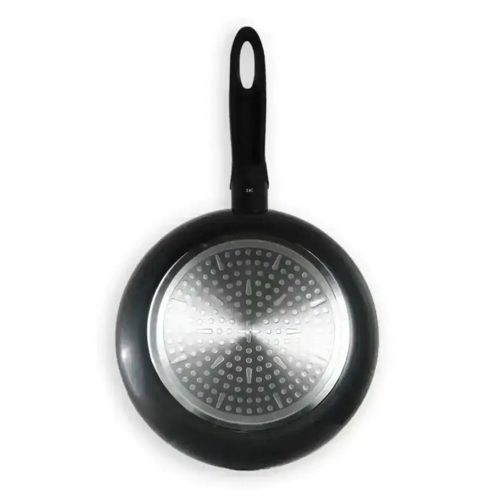 Black frying pan with a perforated metal lid on a white background