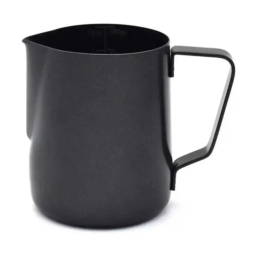 Black milk pitcher with handle on a white background