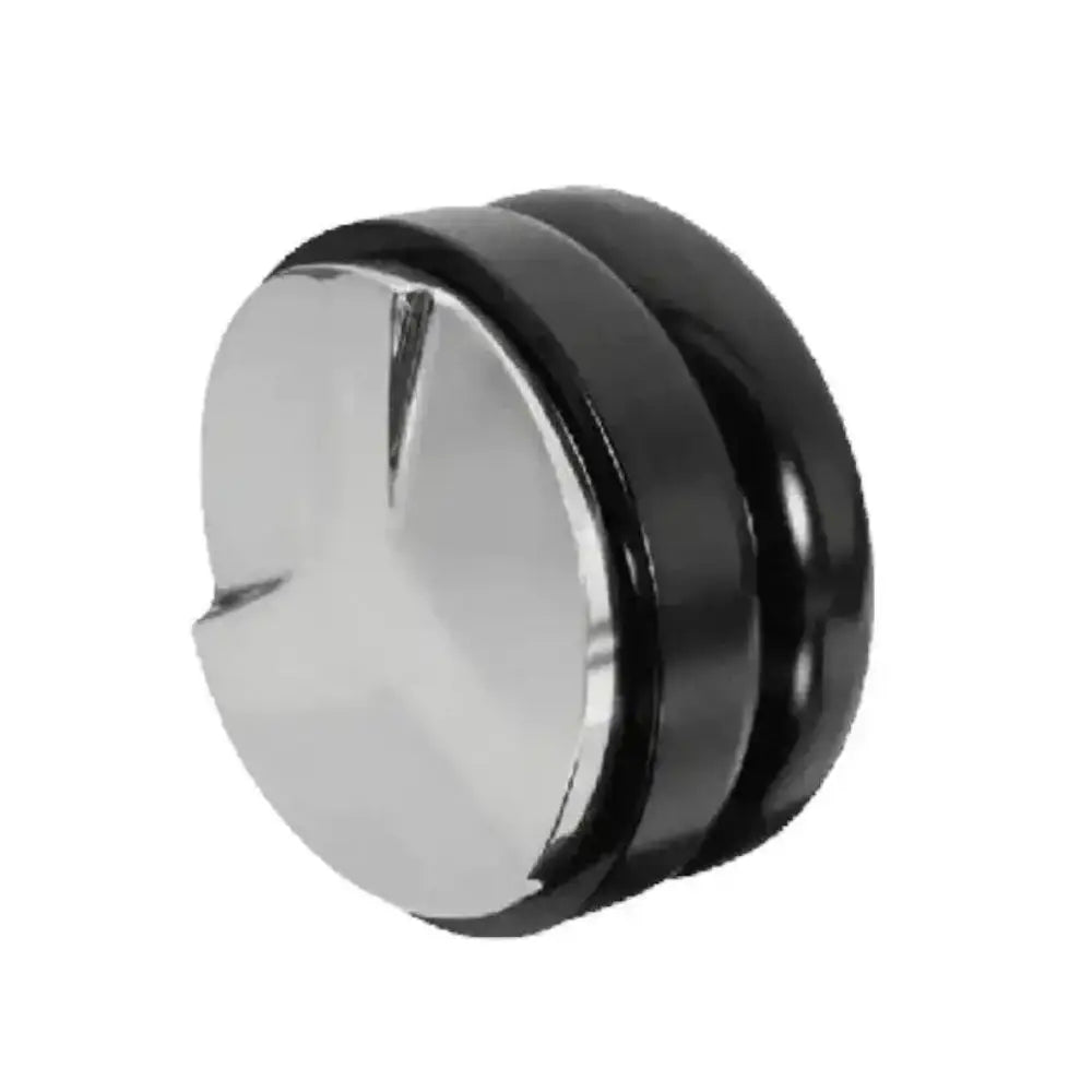 Round metallic object with black rim on a white background