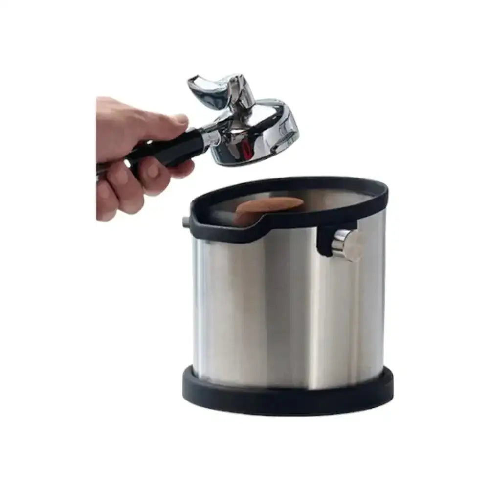 Stainless steel coffee knock box with portafilter and black base for espresso grounds