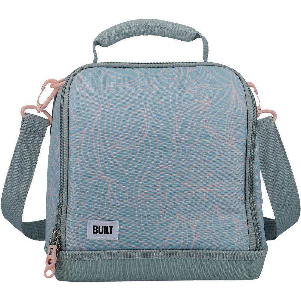 Blue patterned lunch bag with shoulder strap on a white background