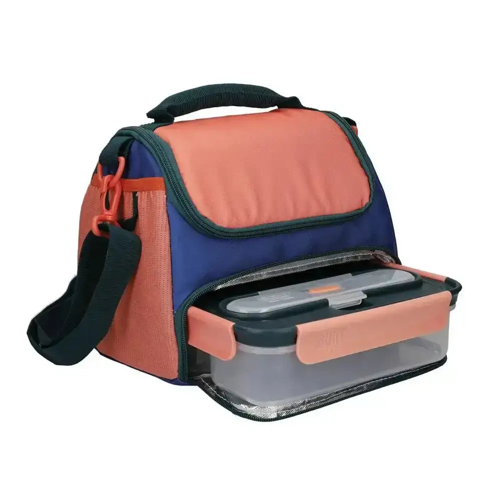 Built prime insulated lunch bag abundance 6l in coral and navy blue with clear plastic container and orange latch for meals