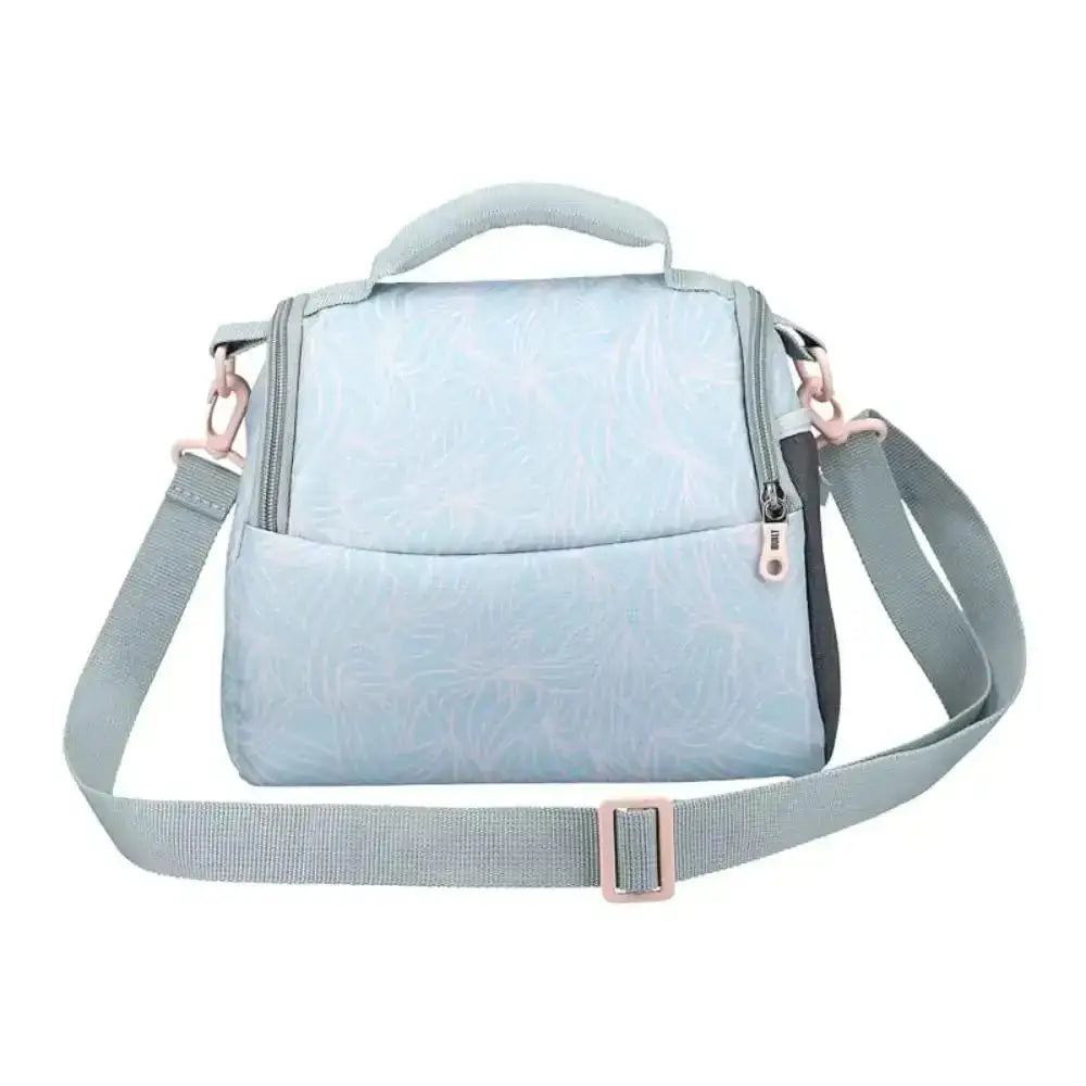 Light blue crossbody bag with a subtle pattern on a white background