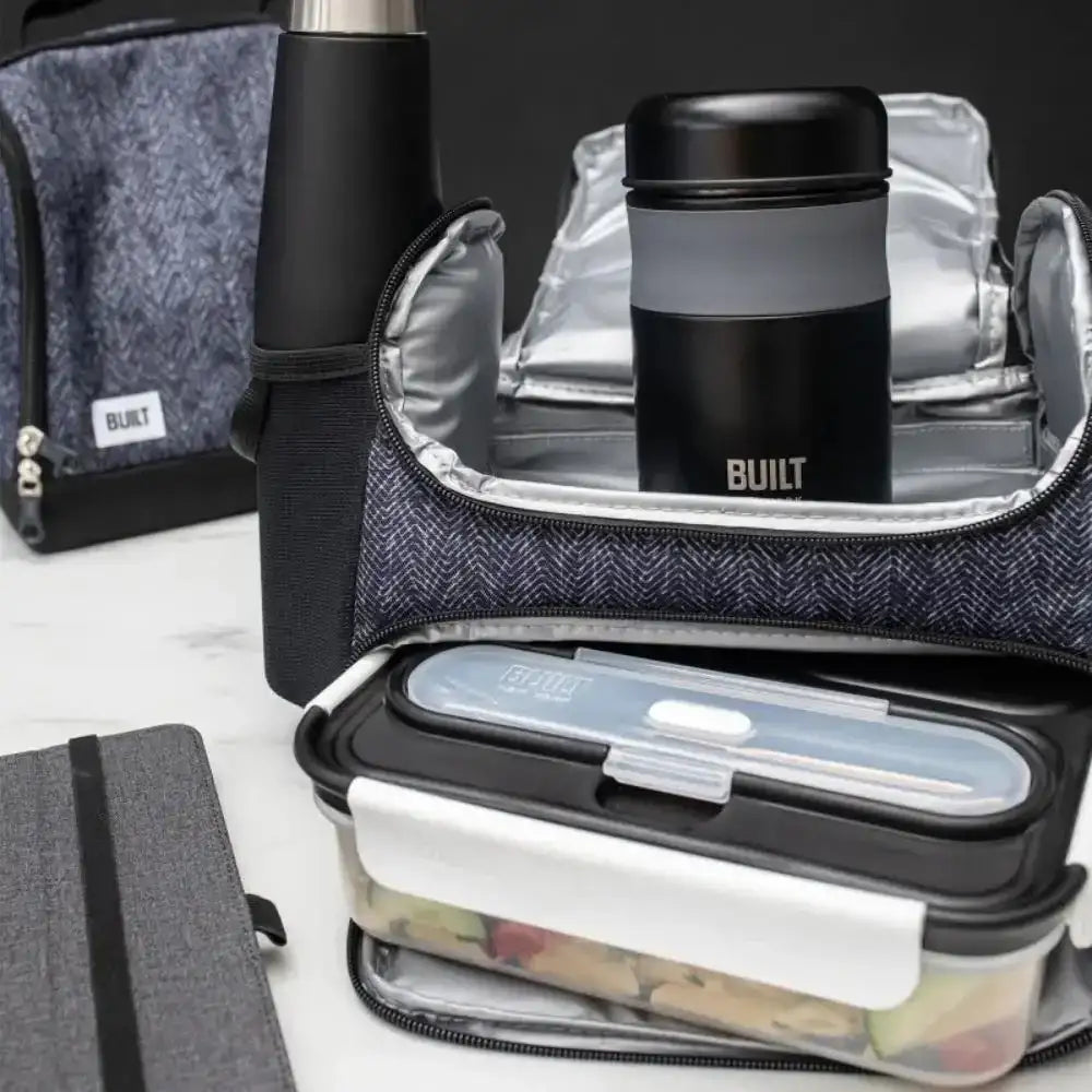 Lunch bag with built containers and insulated bag on a white surface