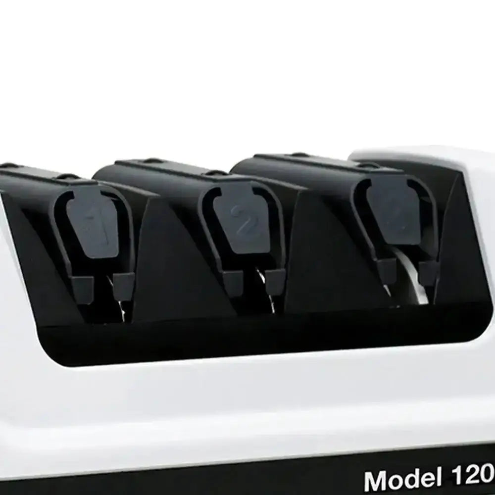 Close-up of a 3-stage electric knife sharpener with numbered sharpening slots