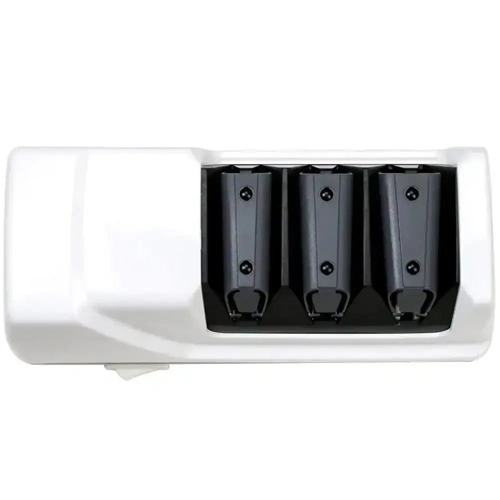 Three-stage electric knife sharpener with black slots in a white housing, top view