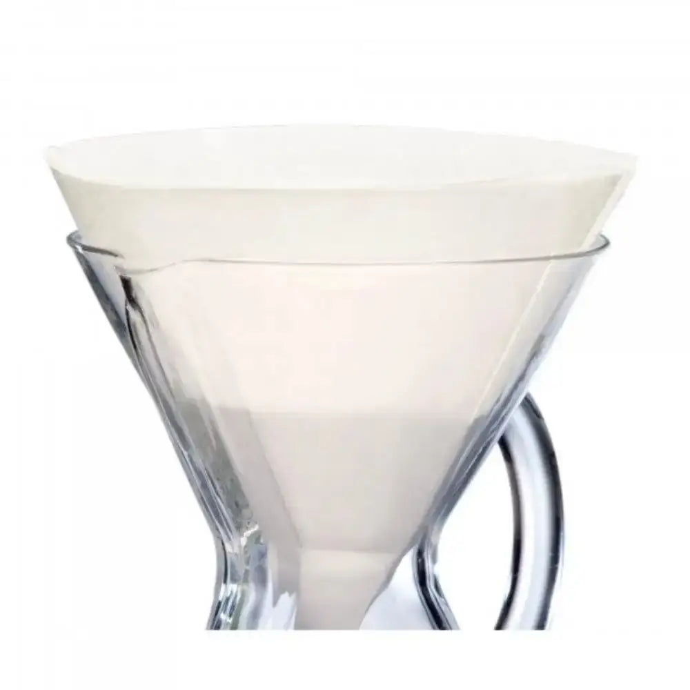 Clear glass with white liquid on a white background