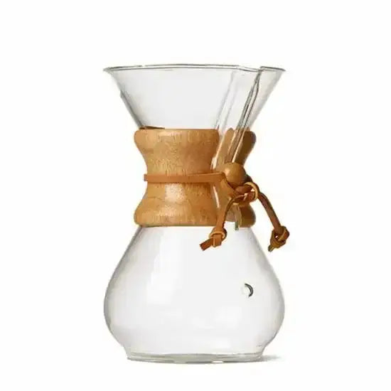 Clear glass coffee maker with wooden collar on a white background