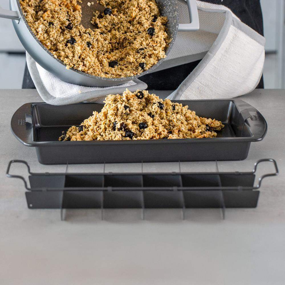 Chicago Metallic non-stick 3-piece brownie pan set with batter being poured at Cookin Stores