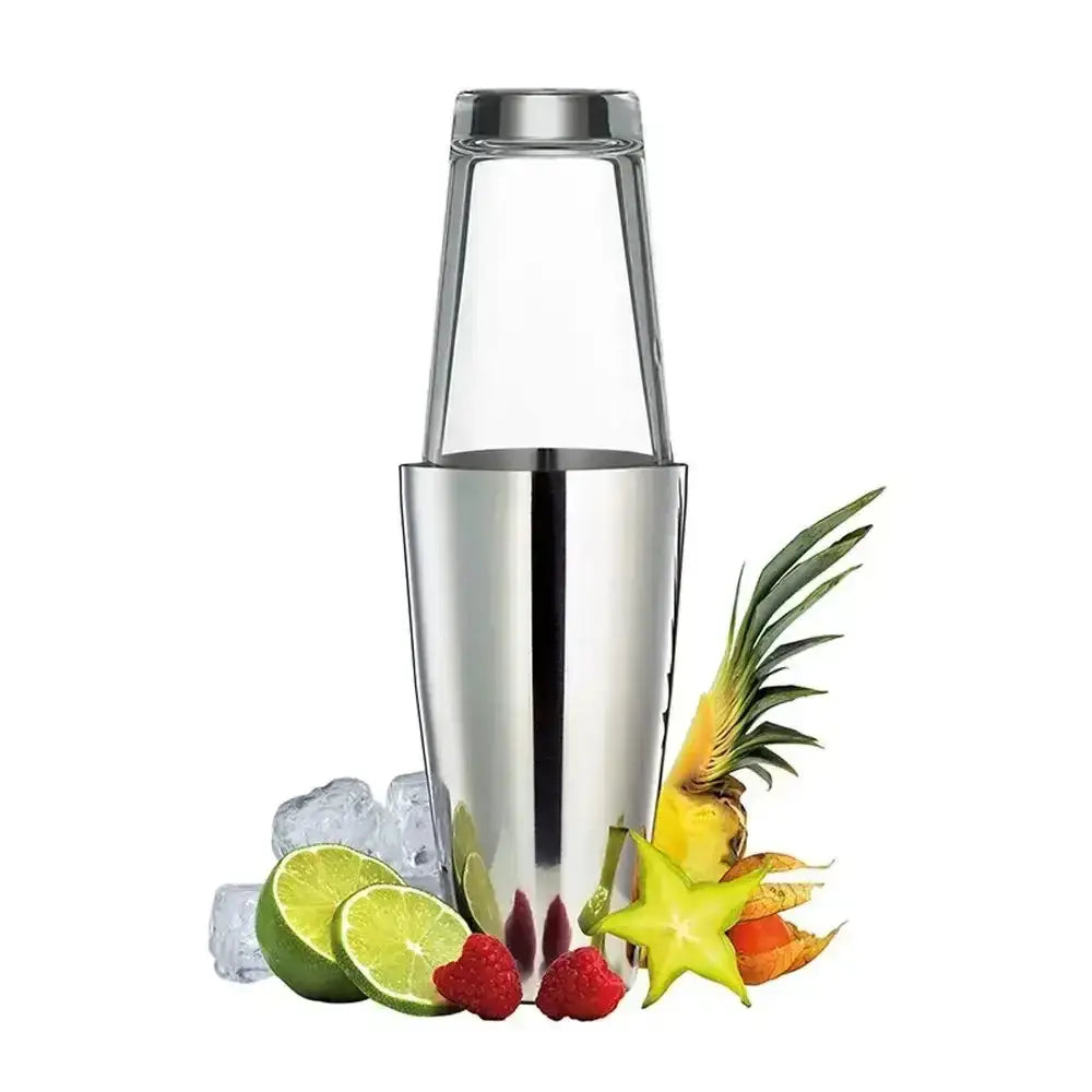 Silver cocktail shaker with fruits and ice on a white background
