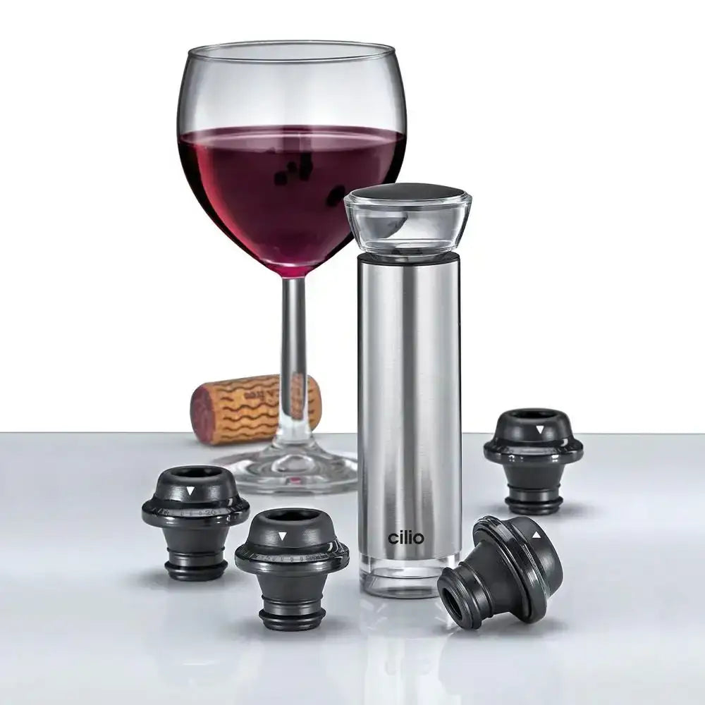 Wine bottle stopper with corkscrew and wine glass on a white background