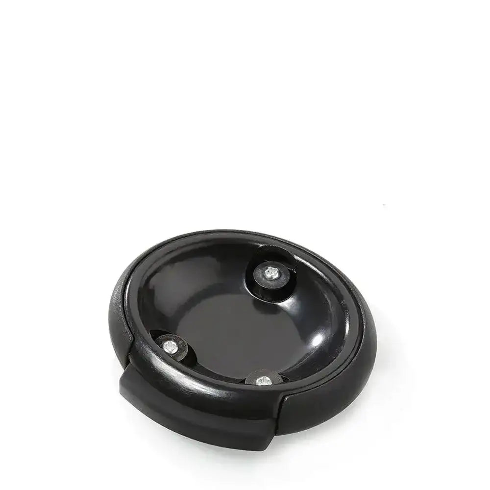 Black round object with a central component on a white background