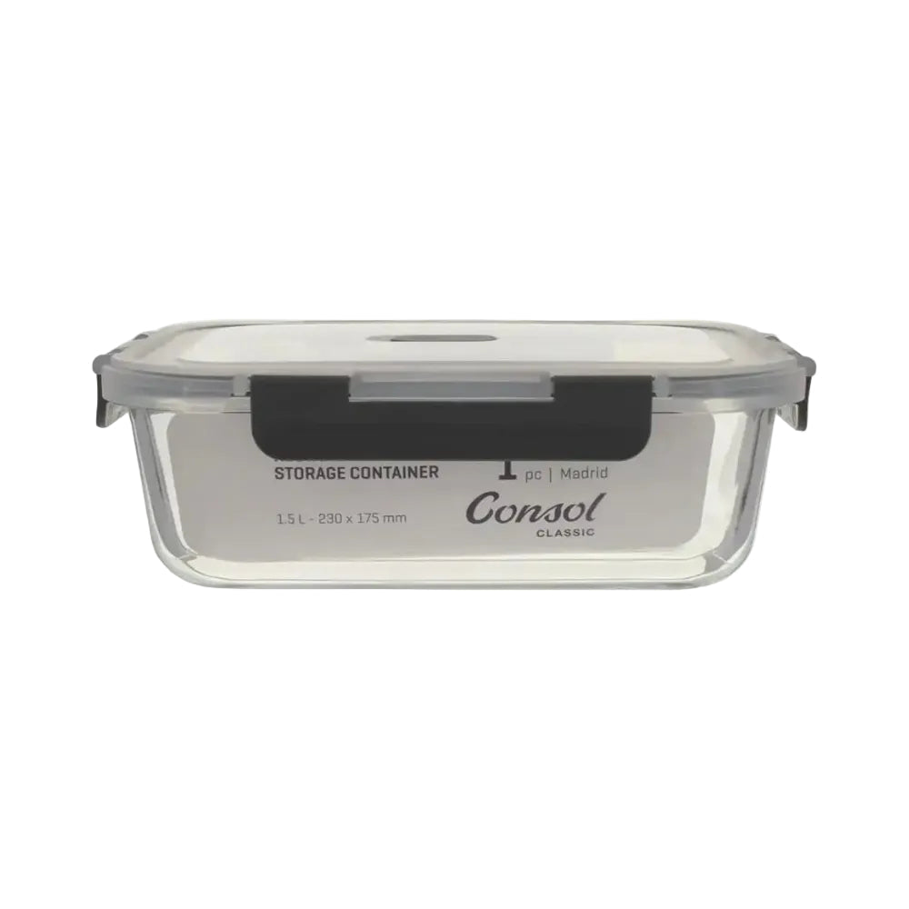 Clear glass storage container with black lid on a white background