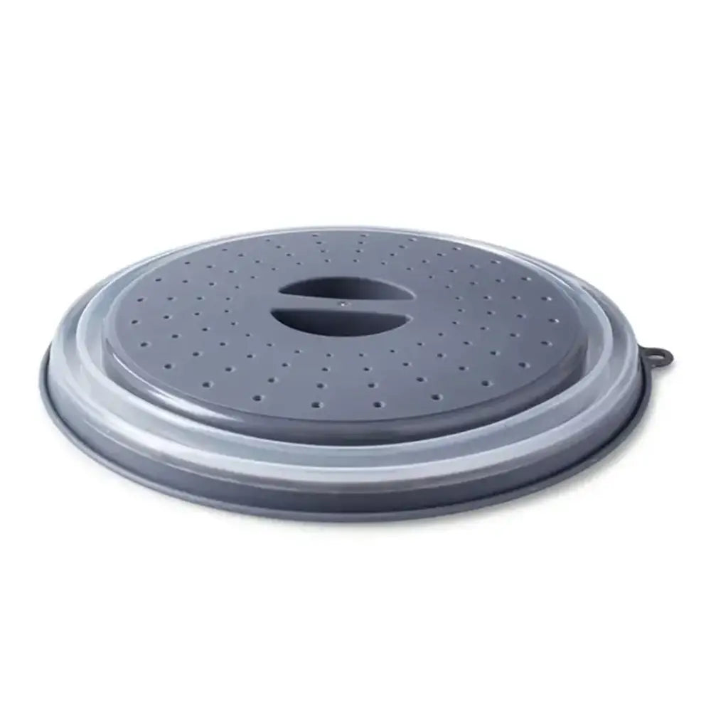 Gray plastic lid with drainage holes on a white background