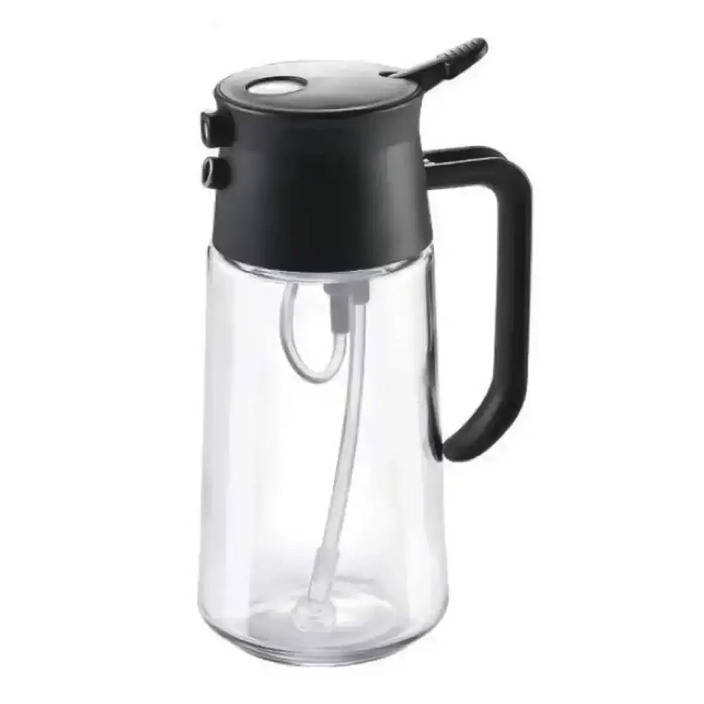 Clear glass container with black lid and handle on a white background