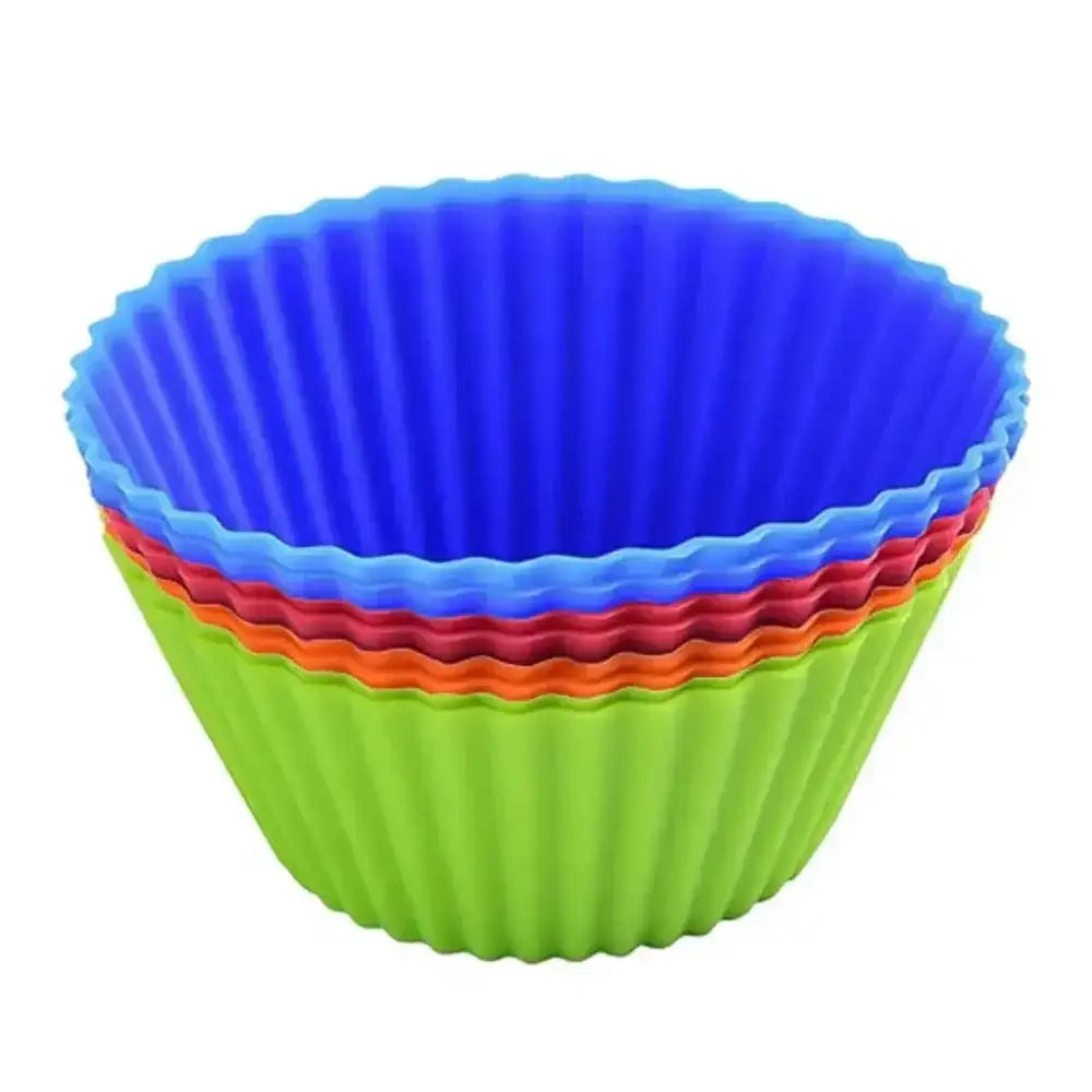 Set of colorful silicone cupcake liners on a white background
