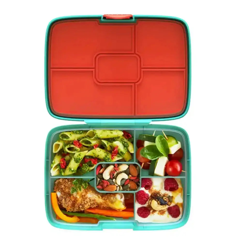 Colorful bento box with compartments filled with food on a white background