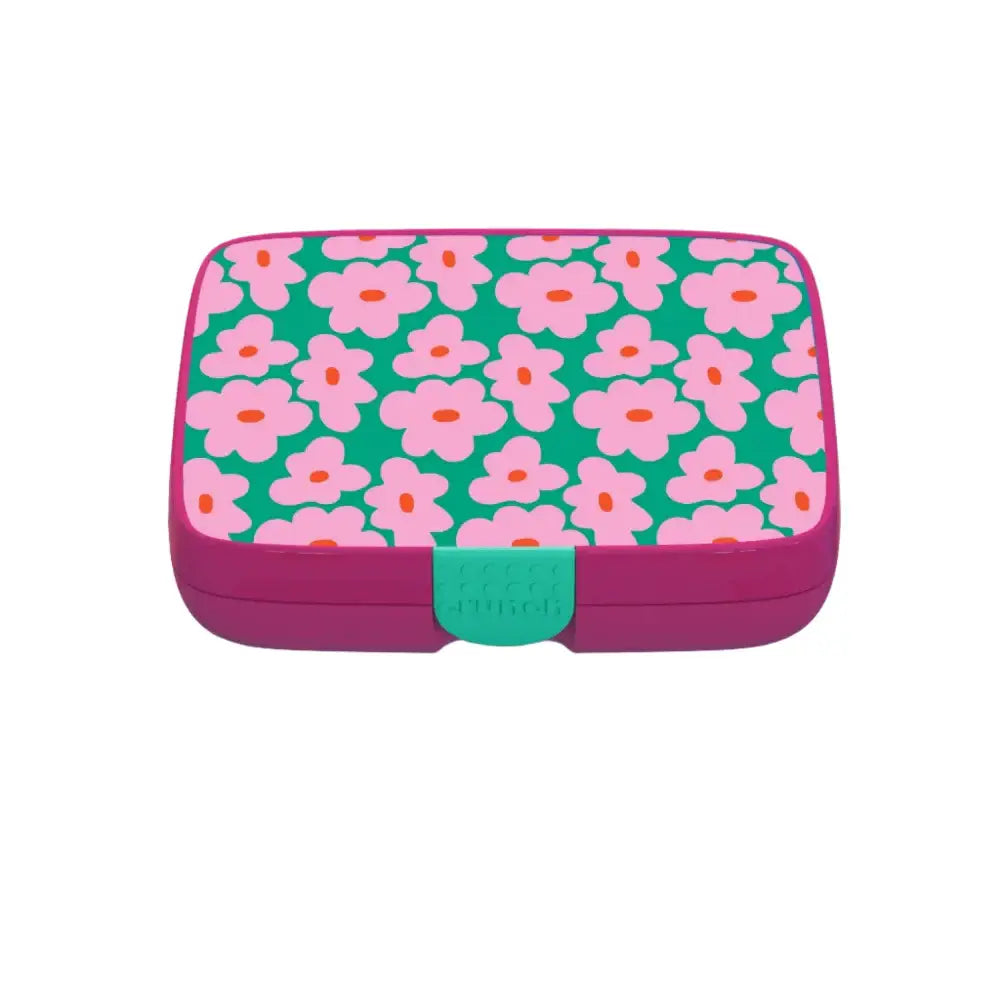 Pink and teal lunchbox with a flower design on a white background