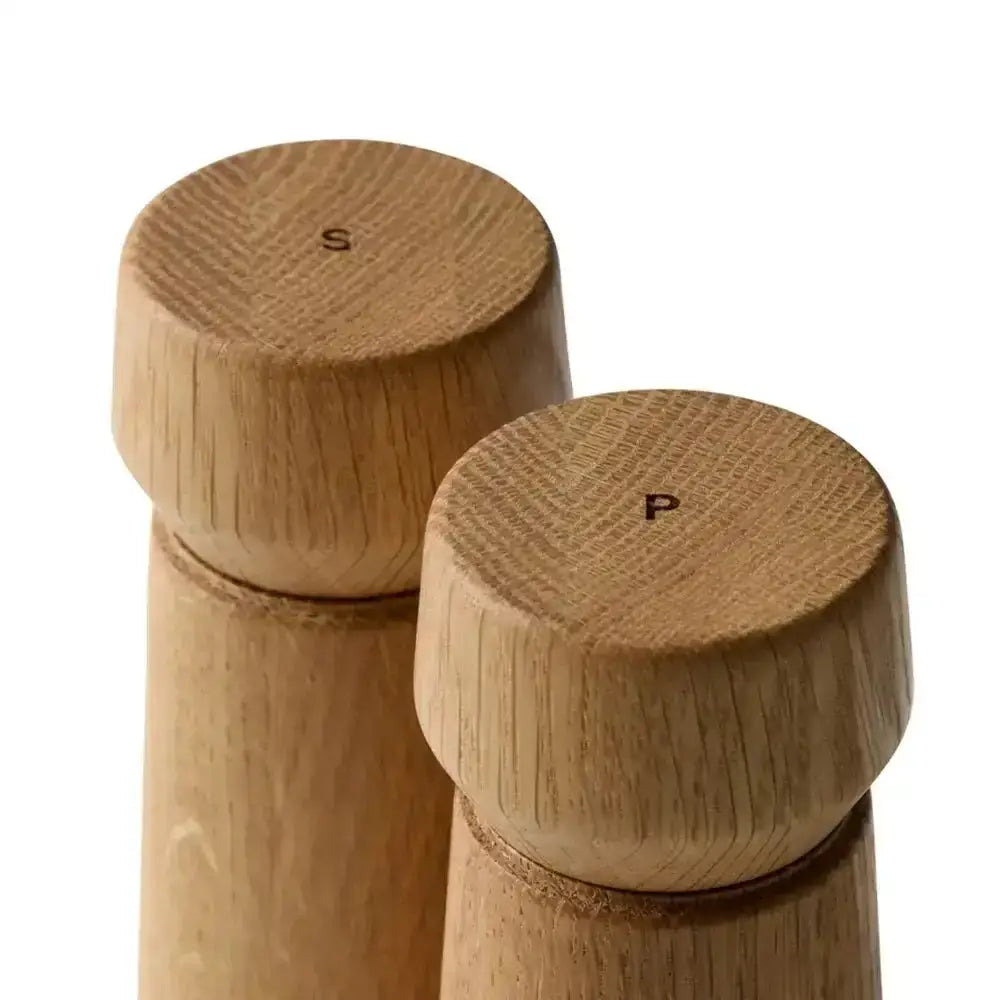 Set of two oak wood grinders for salt and pepper with S and P labels on top