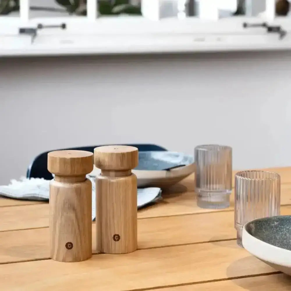 Crushgrind Helsinki oak salt and pepper grinder set on a wooden kitchen table at Cookin Stores