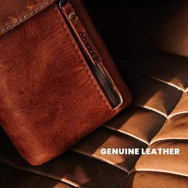 Genuine leather brown zip pouch on a quilted leather surface, premium kitchenware accessory