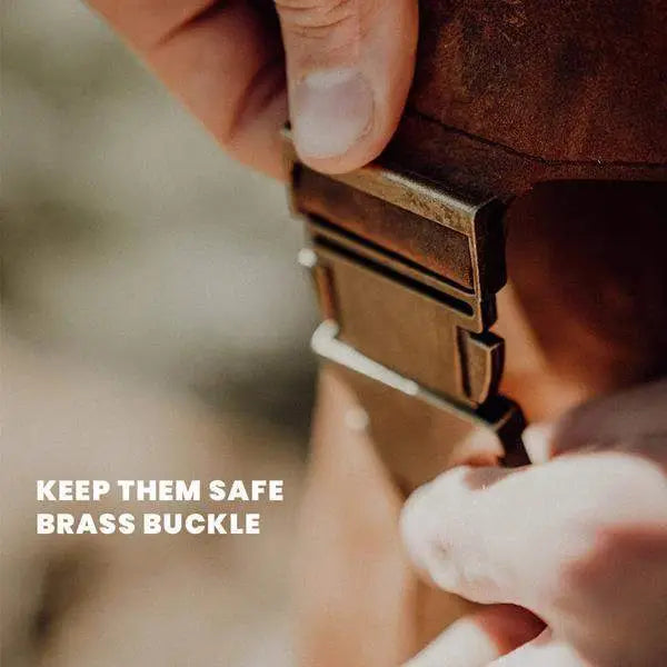 Close-up of hands fastening a brass buckle on a brown leather bag, Cookin Stores premium kitchenware.