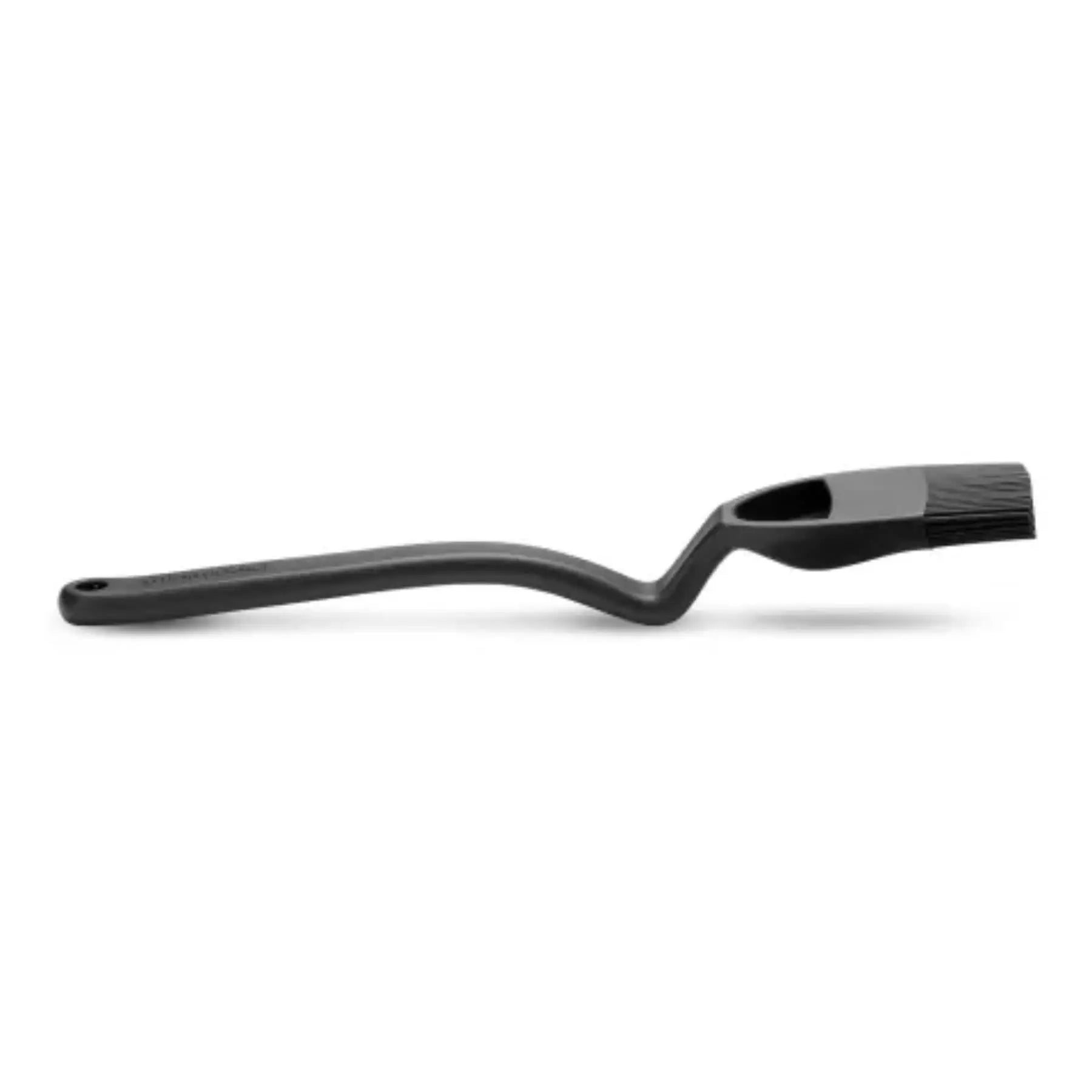 Black silicone bristles on dreamfarm bbq brizzle bristle basting brush with curved handle for easy grilling