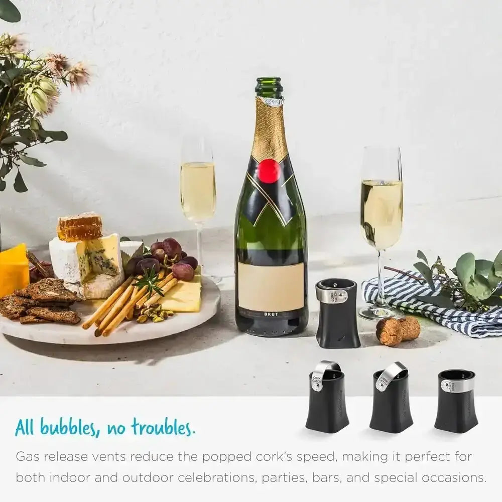 Champagne bottle and flutes with Dreamfarm Champop opener, cheese platter, kitchenware from Cookin Stores