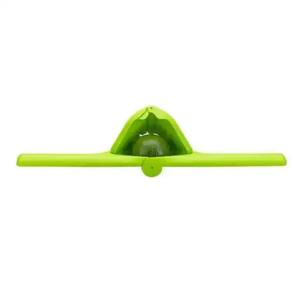 Green Dreamfarm Fluicer lime squeezer kitchen tool on white background, Cookin Stores
