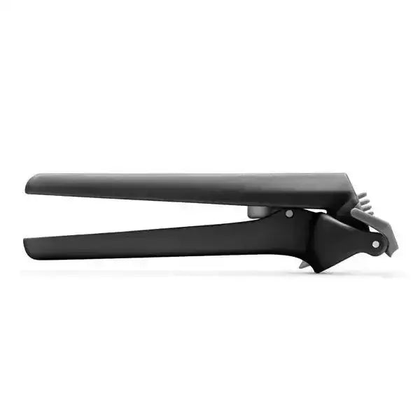 Dreamfarm Garject Lite black garlic press kitchen tool on white background, Cookin Stores