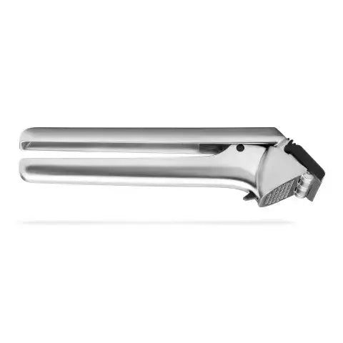 Metallic garlic press on a white background