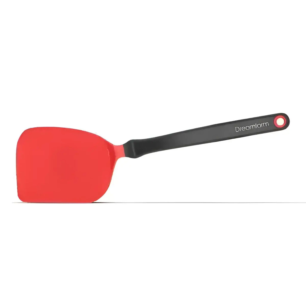 Red spatula with black handle on a white background