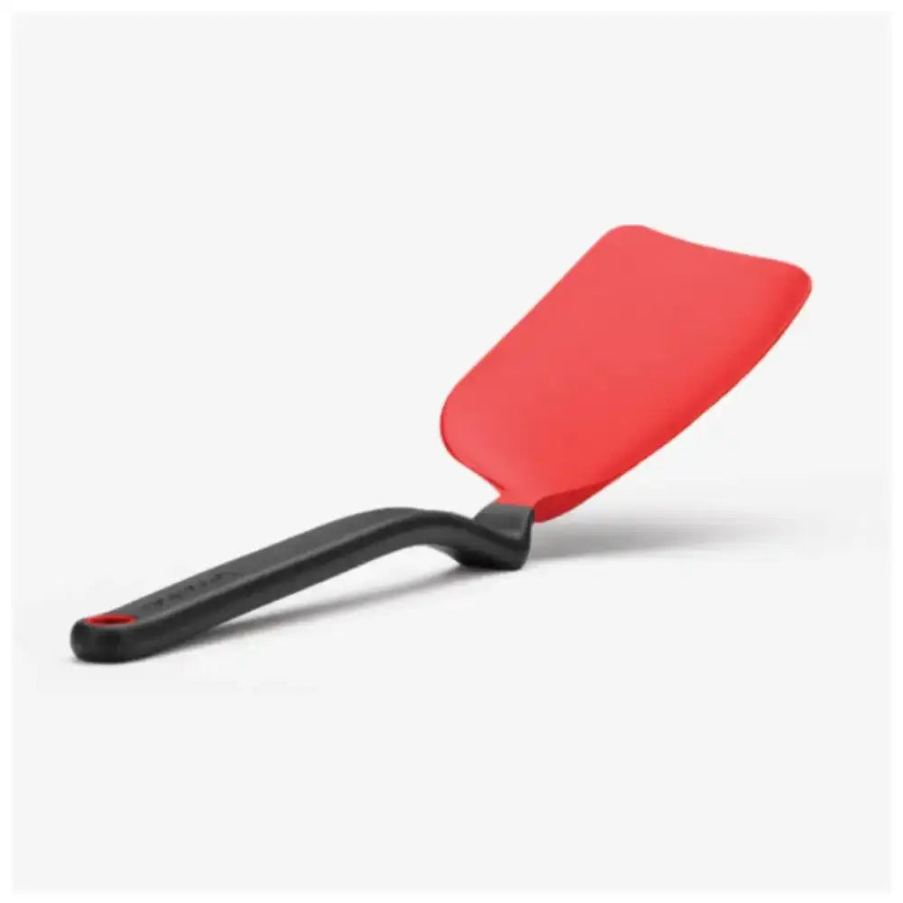 Red spatula with black handle on a white background