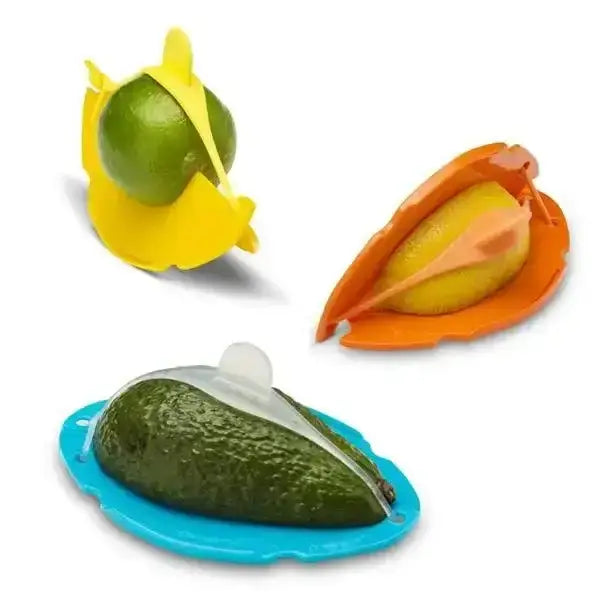 Colorful silicone fruit savers holding lime, lemon, and avocado on white, Cookin Stores kitchenware