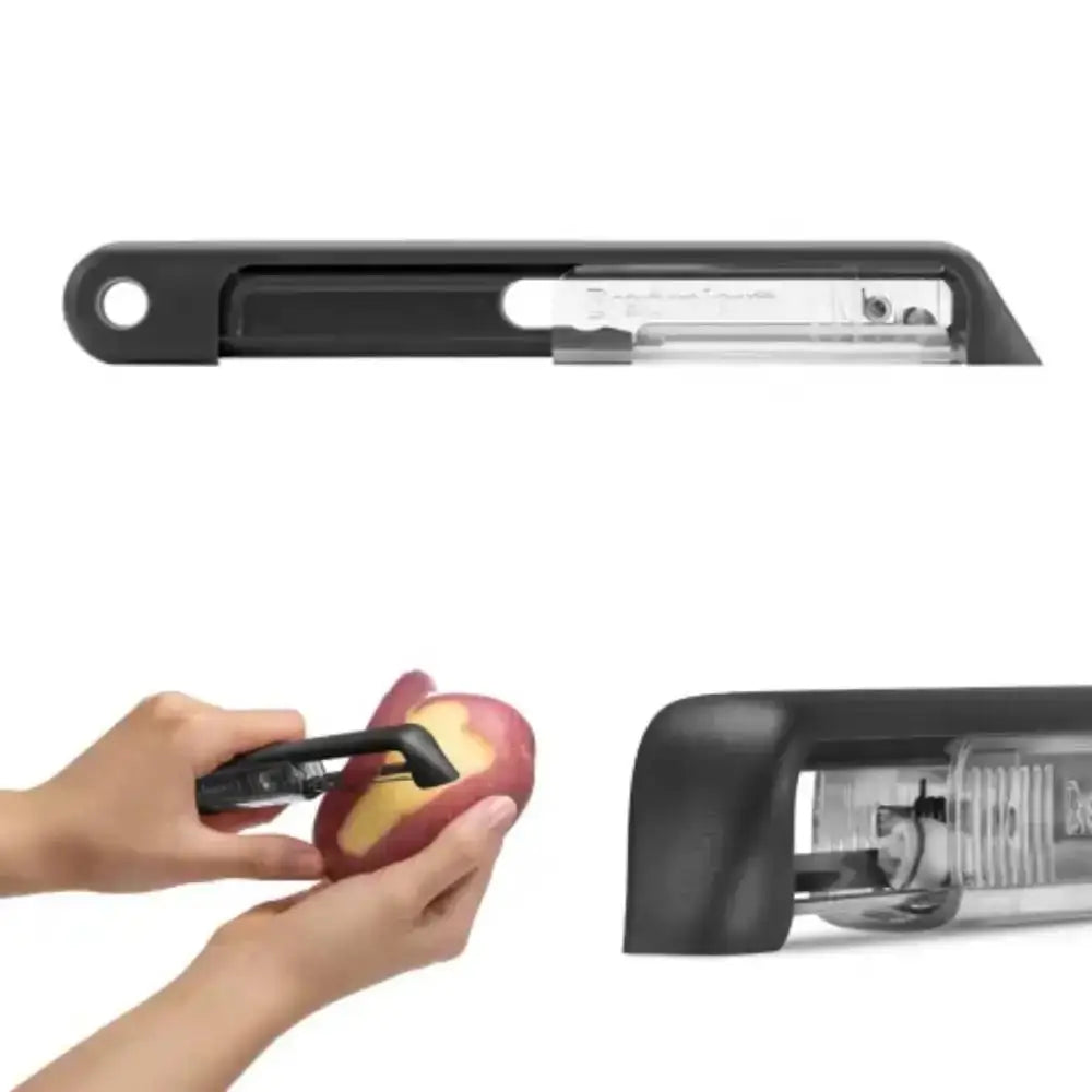 Black apple peeler being used to peel an apple on a white background
