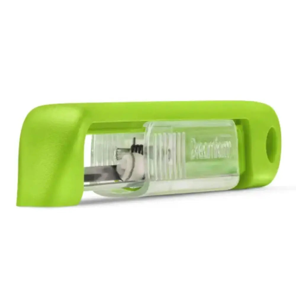 Green peeler on a white background