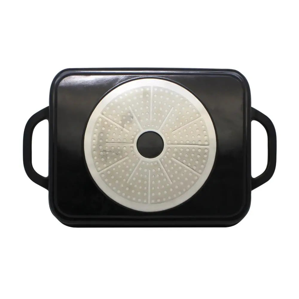 Black rectangular pan with a white circular lid on a white background