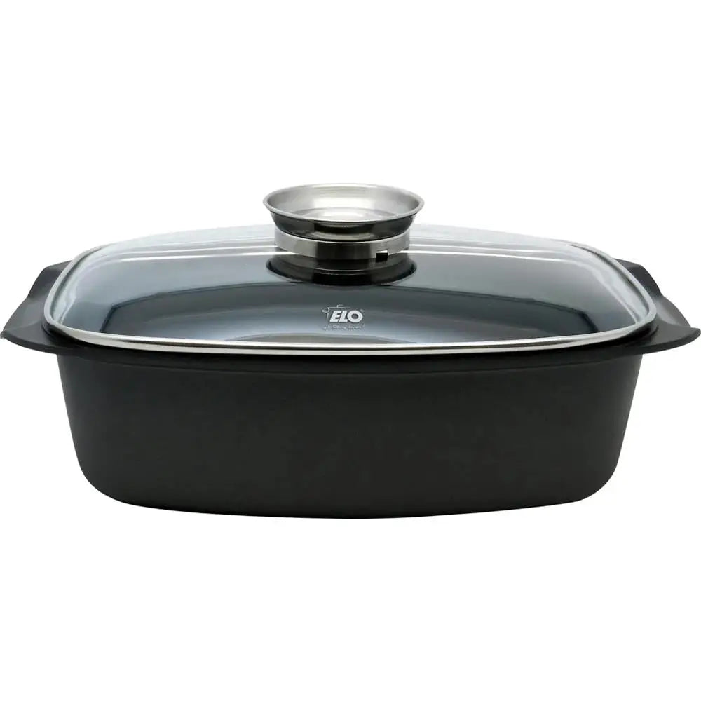 Black rectangular baking dish with glass lid and metal handle on a white background