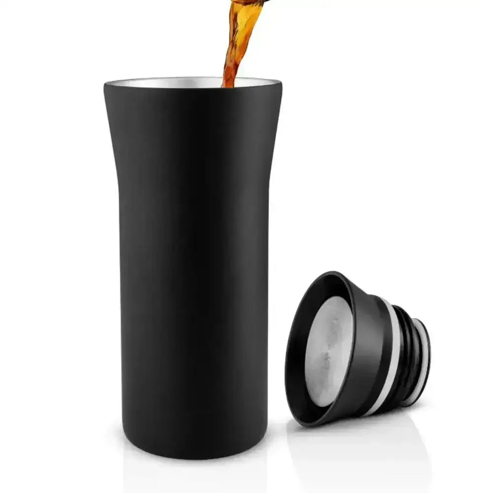 Eva Solo City To Go Cup 350ml black travel mug with lid, coffee being poured, Cookin Stores kitchenware.