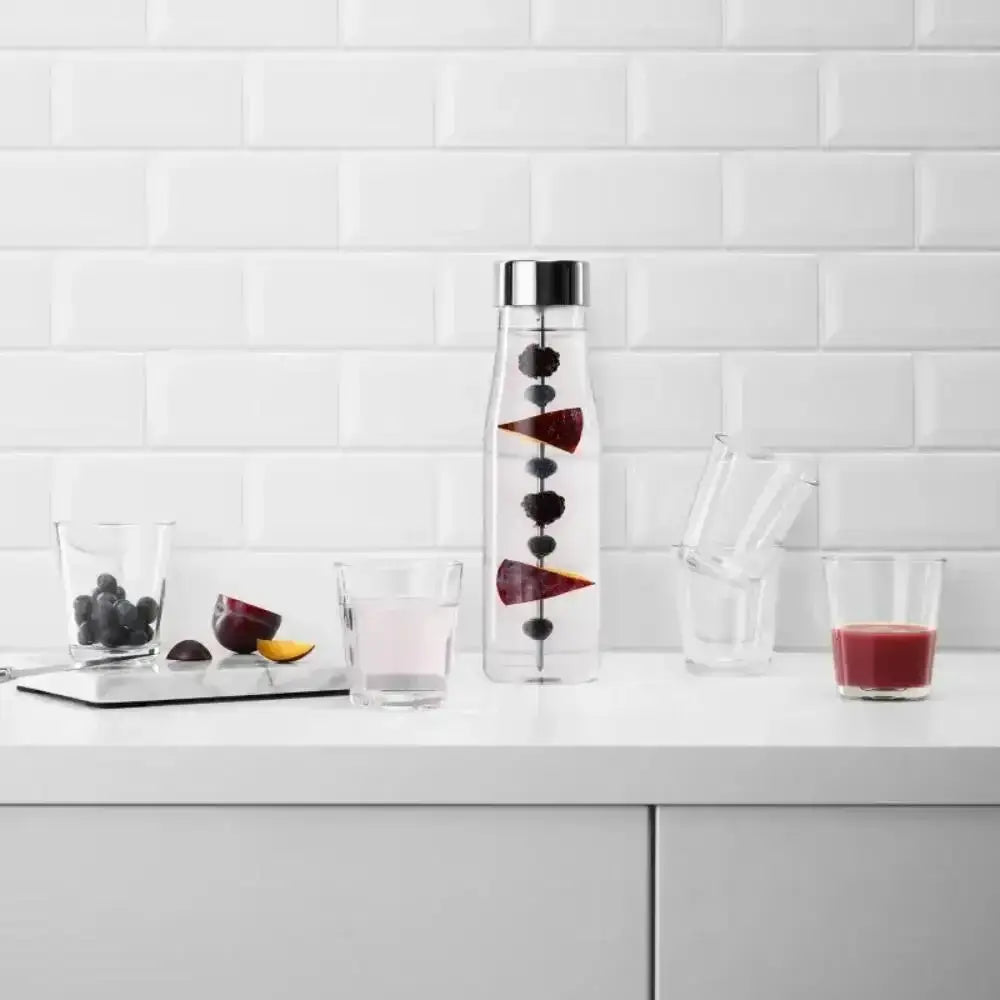EVA Solo tumblers set of 12, 250ml, clear glassware and fruit-infused water on white countertop