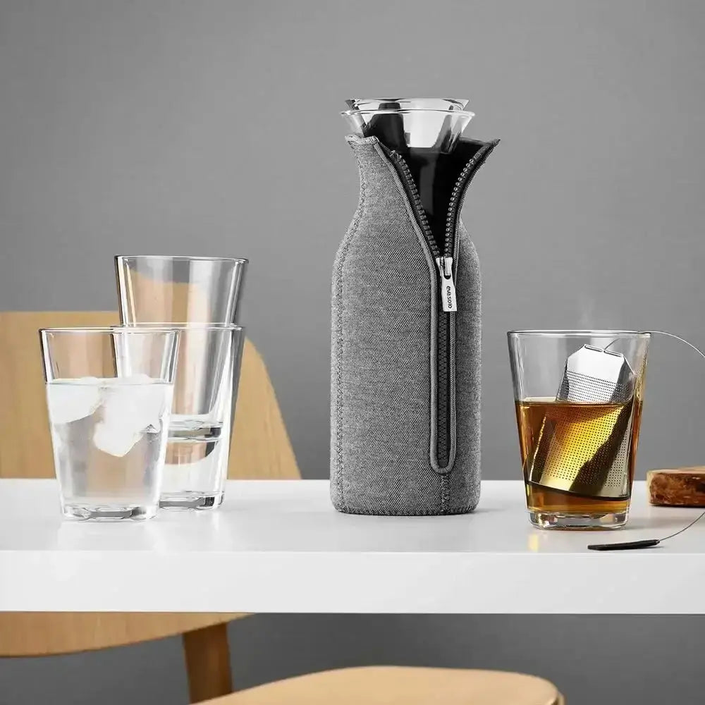 EVA Solo tumblers set with modern glassware and grey insulated carafe on white table, Cookin Stores kitchenware