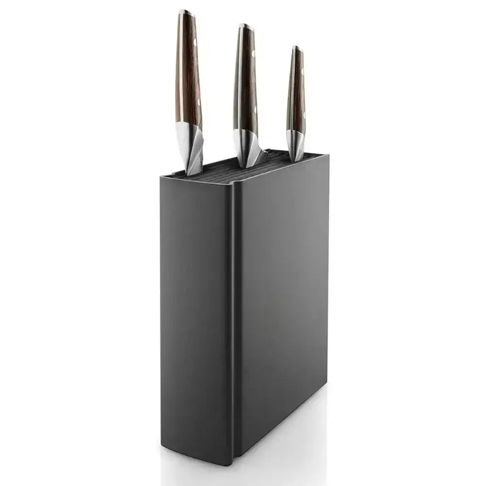 Modern black knife block set with three stainless steel kitchen knives on white background