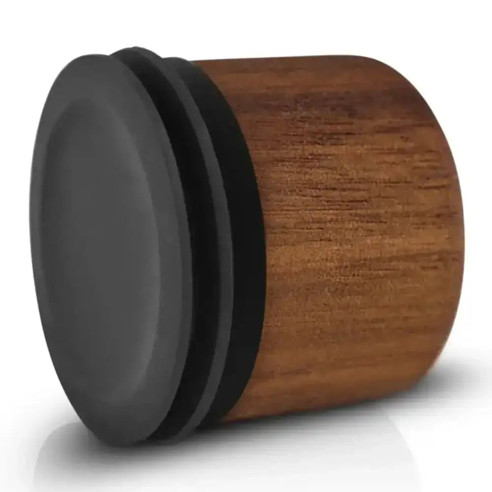 Wooden container with a black lid on a white background