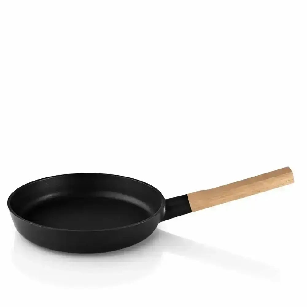 Black frying pan with a wooden handle on a white background