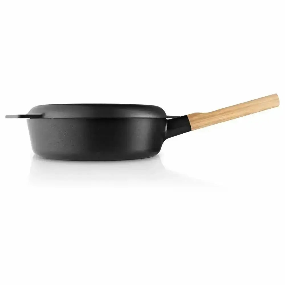 Black frying pan with a wooden handle on a white background