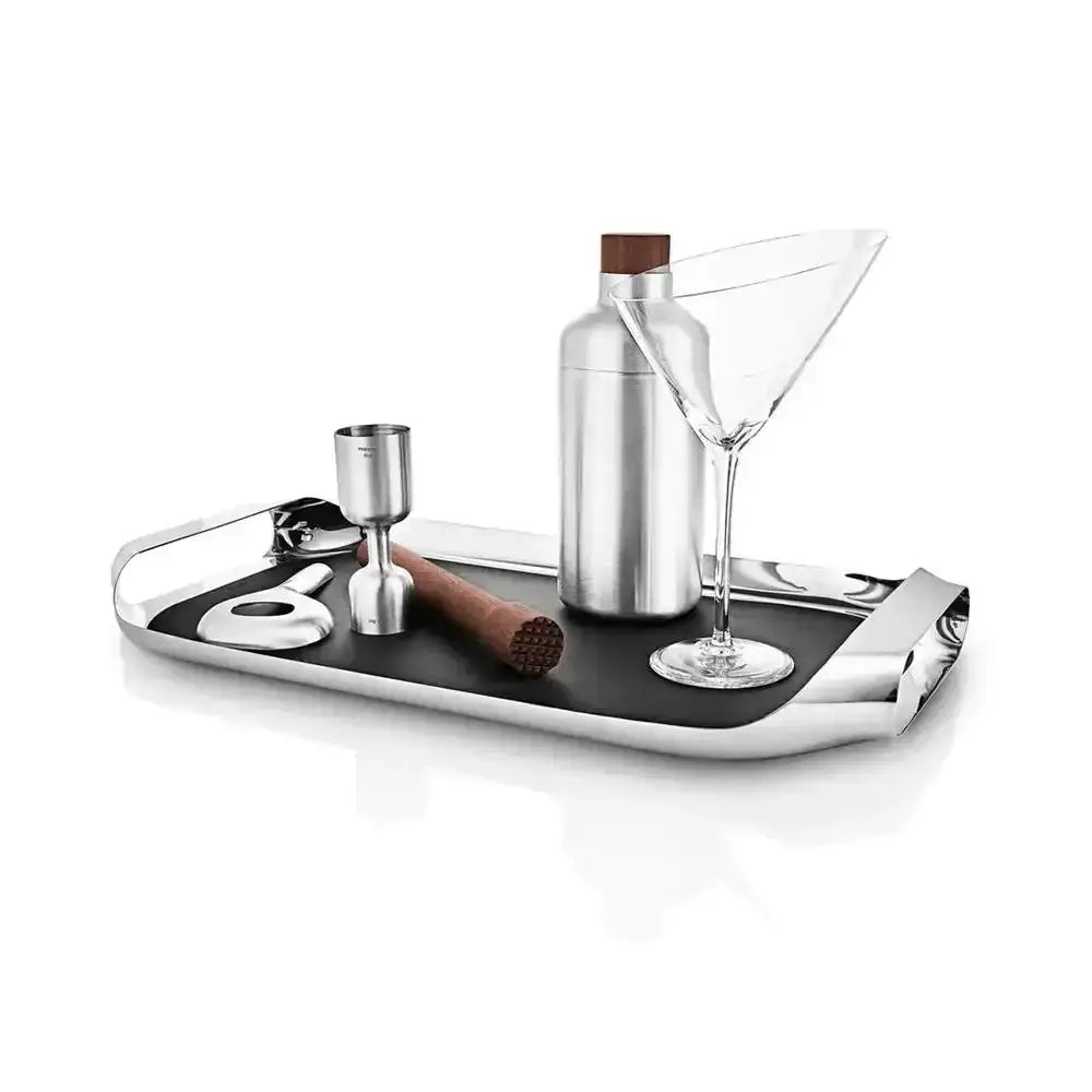 Eva Solo stainless steel serving tray with bar tools and martini glass on white background