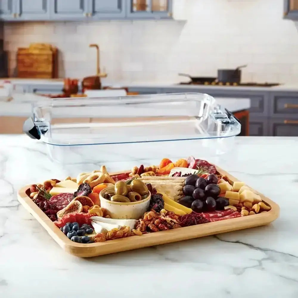 Farberware bamboo rectangular serving board 28cm with natural finish holding assorted cheeses meats fruits and nuts