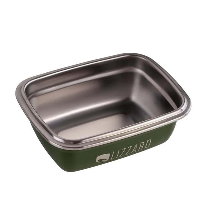 Green food container with metal lid on a white background