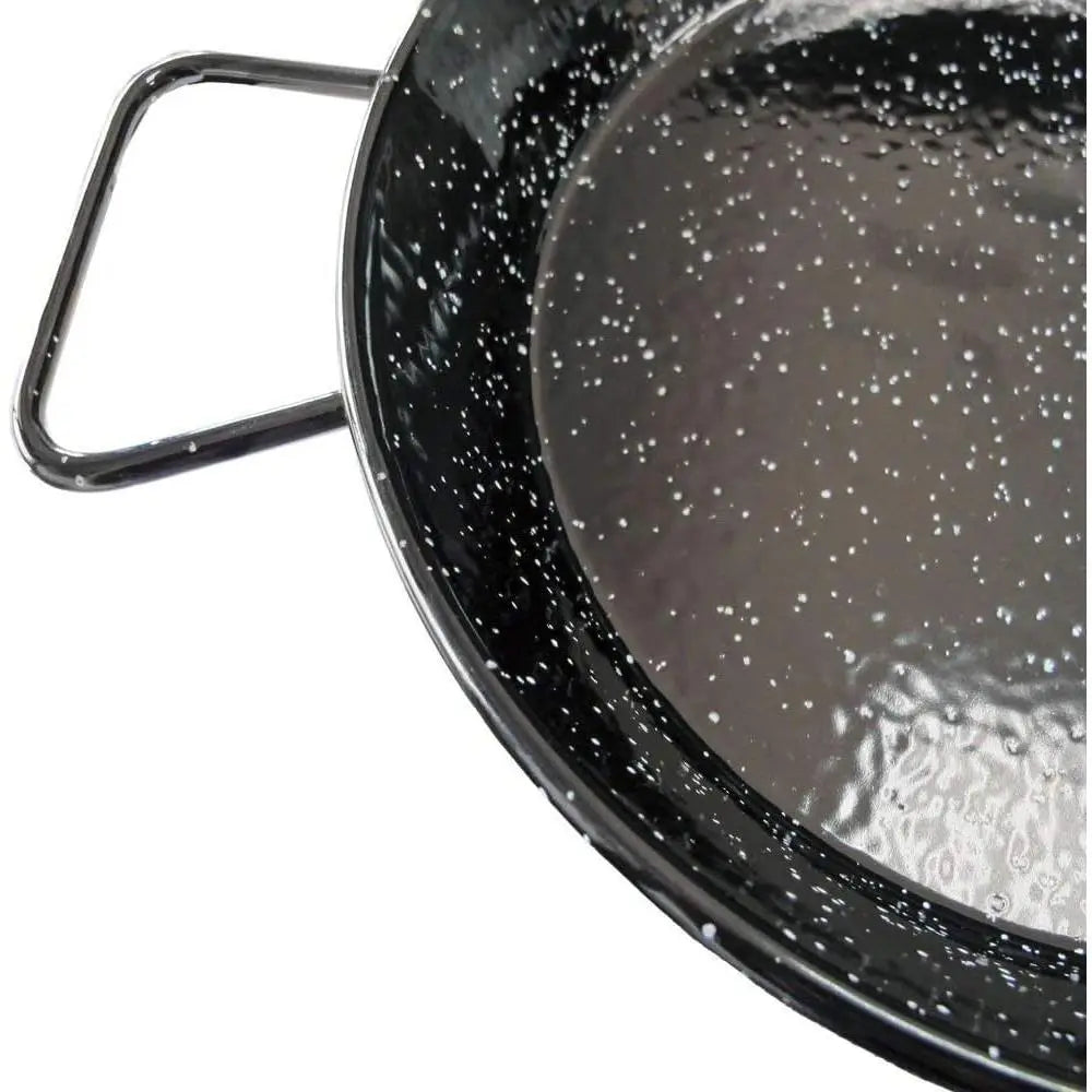 Black speckled cookware with a handle on a white background