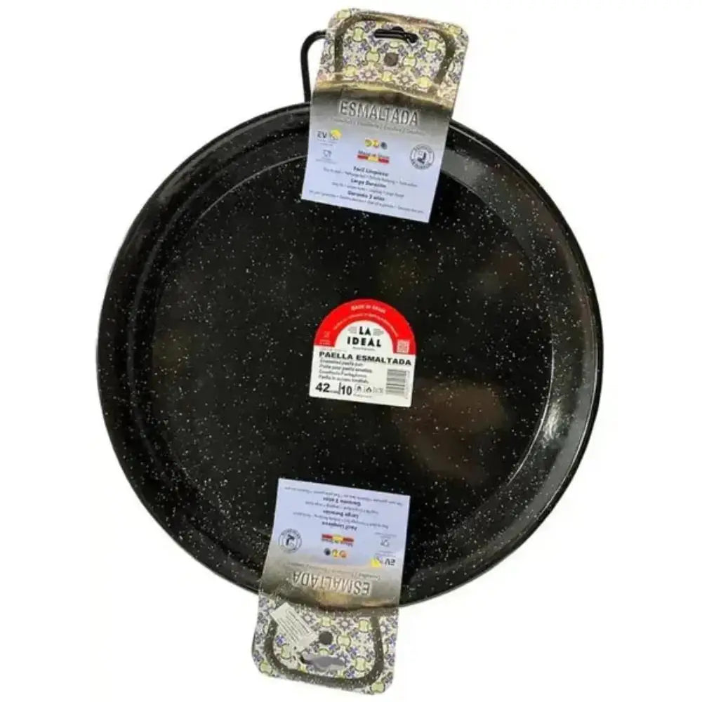 Black enameled frying pan with packaging on a white background